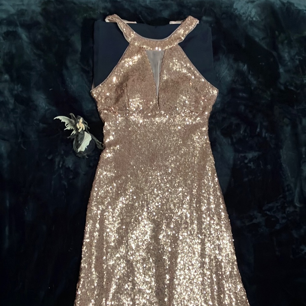 Gala evening dress. Light rose color. Sequins all over